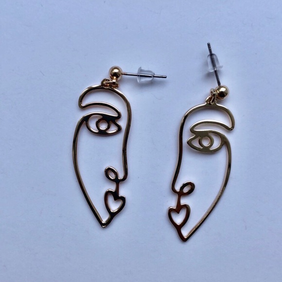Urban Outfitters Accessories - Face abstract earrings